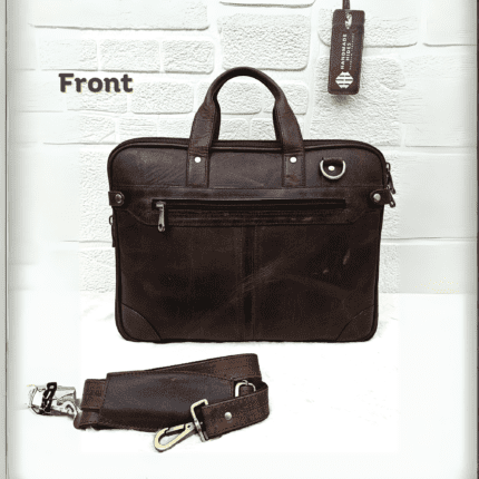 Handmade leather laptop bag in vintage brown with detachable strap, designed for professionals, featuring spacious compartments and premium craftsmanship.