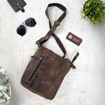 Elevate your style with this Handcrafted Vintage Leather Crossbody Bag, crafted from durable full-grain leather. Featuring a rustic design, adjustable strap, and spacious interior, it’s perfect for work, travel, and casual outings.