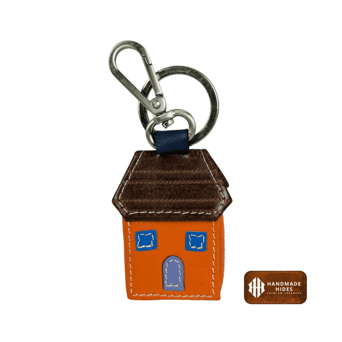 House-shaped orange leather keyring and key holder by Handmade Hides, crafted from premium leather for a vibrant, durable, and functional accessory. Perfect for men and women.