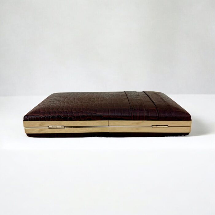 Luxurious brown croc-embossed leather clutch with gold chain strap