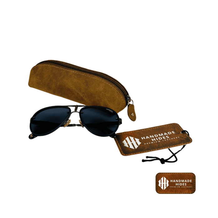 Tan genuine leather sunglass pouch with a sleek design and secure closure, perfect for men and women.