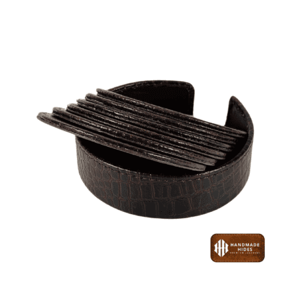 Luxury round leather coasters in premium brown leather with a matching holder, perfect for protecting furniture and enhancing decor in home or office settings.