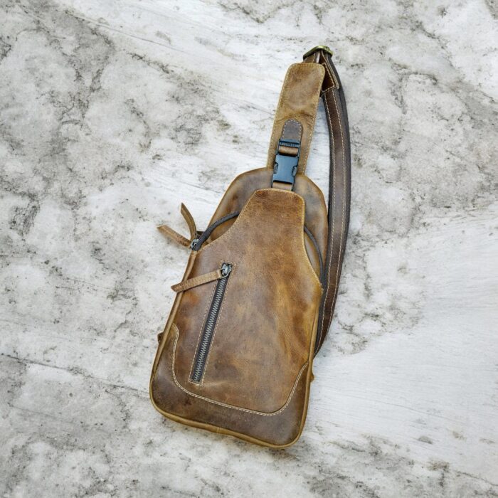 Compact and stylish leather sling bag for men and women
