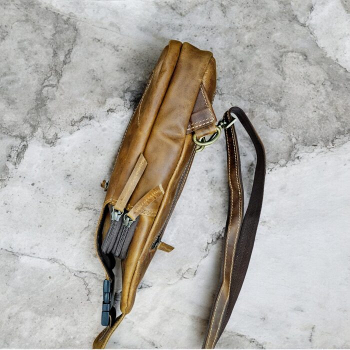 Compact and stylish leather sling bag for men and women