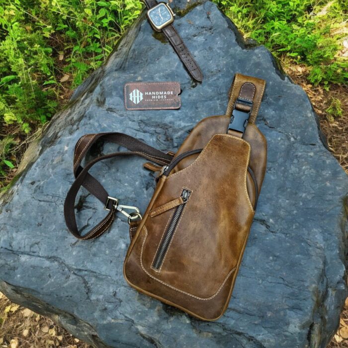 Handmade brown leather sling bag with adjustable strap