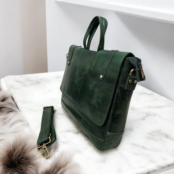 Side view of the Genuine Leather Laptop Bag featuring an adjustable shoulder strap