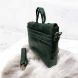 Side view of the Genuine Leather Laptop Bag featuring an adjustable shoulder strap