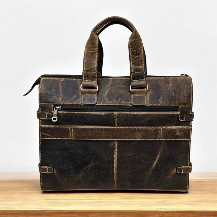 Handmade brown leather briefcase with a classic finish and premium craftsmanship, perfect for professionals and travelers