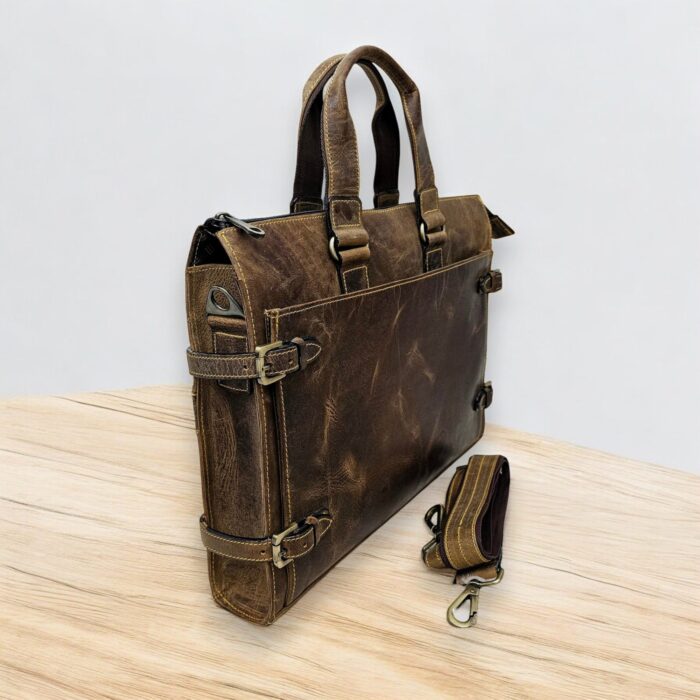 Handmade brown leather briefcase with a classic finish and premium craftsmanship, perfect for professionals and travelers