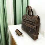 Handmade brown leather briefcase with a classic finish and premium craftsmanship, perfect for professionals and travelers