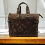 Handmade brown leather briefcase with a classic finish and premium craftsmanship, perfect for professionals and travelers
