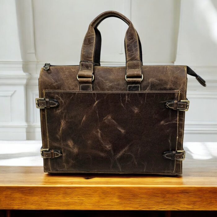 Handmade brown leather briefcase with a classic finish and premium craftsmanship, perfect for professionals and travelers