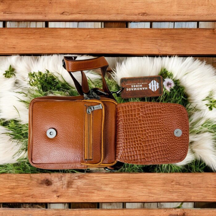 Handmade crocodile-embossed leather crossbody bag with a rich brown finish, adjustable strap, and multiple compartments for everyday essentials.