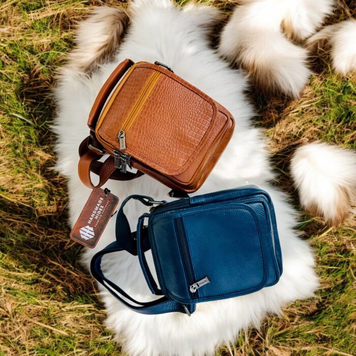 Handmade crocodile-embossed leather crossbody bag with a rich brown finish, adjustable strap, and multiple compartments for everyday essentials.