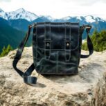 Handcrafted genuine leather sling bag made from ethically sourced goat leather. Compact yet spacious crossbody bag with zippered pockets and adjustable strap. Unisex design, perfect for work, travel, or everyday use. Durable, stylish, and eco-friendly.