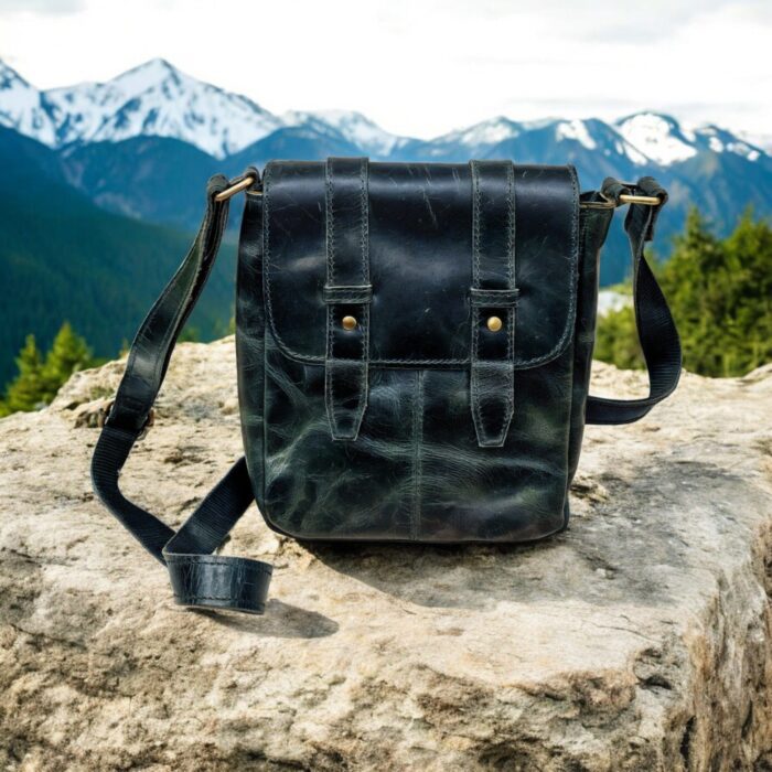 Handcrafted genuine leather sling bag made from ethically sourced goat leather. Compact yet spacious crossbody bag with zippered pockets and adjustable strap. Unisex design, perfect for work, travel, or everyday use. Durable, stylish, and eco-friendly.