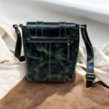 Handcrafted genuine leather sling bag made from ethically sourced goat leather. Compact yet spacious crossbody bag with zippered pockets and adjustable strap. Unisex design, perfect for work, travel, or everyday use. Durable, stylish, and eco-friendly.