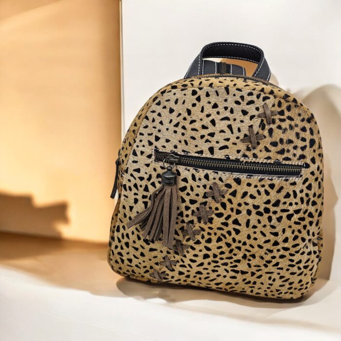 Luxury handmade goat leopard print leather backpack with padded adjustable straps