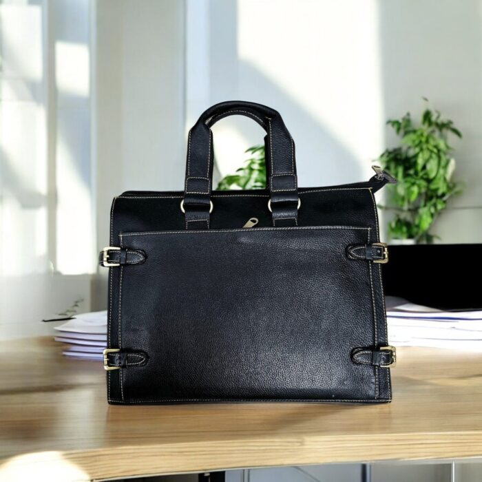 Premium black leather laptop bag with a sleek, professional design for business and travel.
