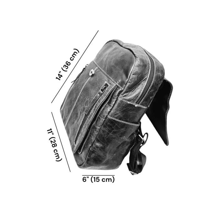 Handcrafted full-grain brown leather backpack with quilted stitching and a front buckle pocket.