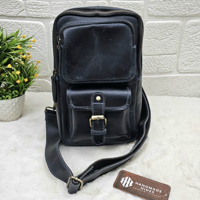 Handmade leather crossbody bag with vintage design and multiple pockets