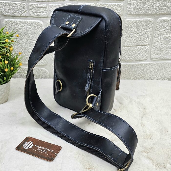 Handmade leather crossbody bag with vintage design and multiple pockets