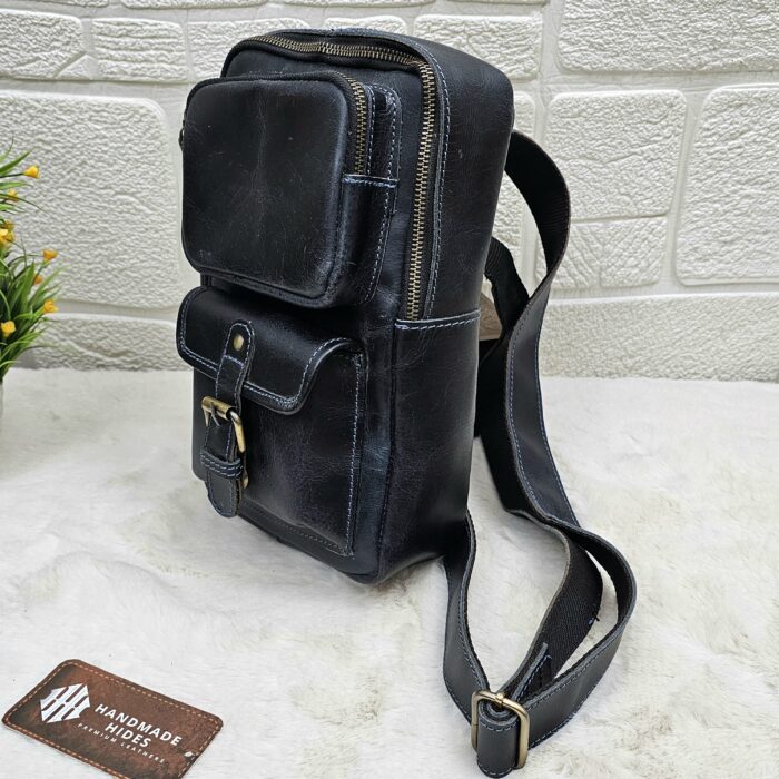Handmade leather crossbody bag with vintage design and multiple pockets