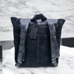 Handmade black suede leather backpack with soft, velvety texture