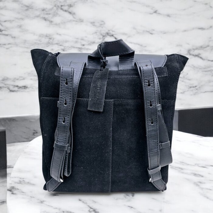 Handmade black suede leather backpack with soft, velvety texture