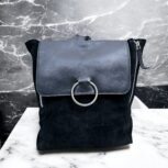 Handmade black suede leather backpack with soft, velvety texture