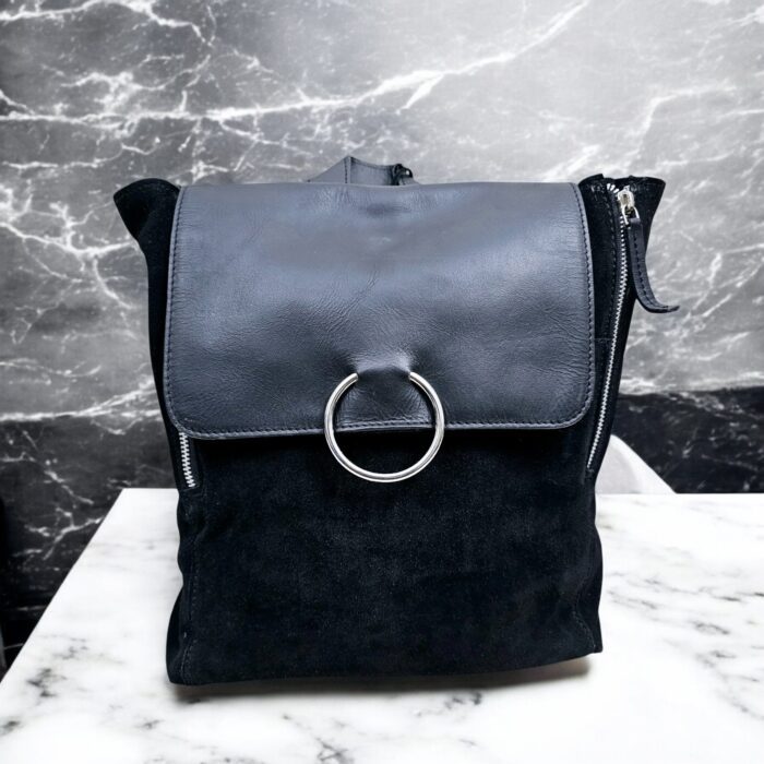 Handmade black suede leather backpack with soft, velvety texture