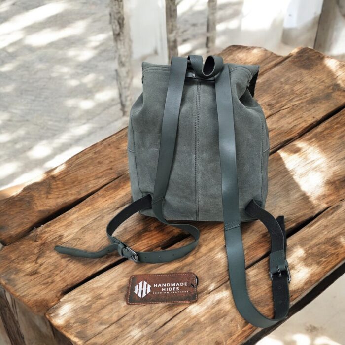 Premium handmade grey leather backpack with spacious compartments, adjustable strap, and multiple pockets. Perfect for work, travel, or daily use.