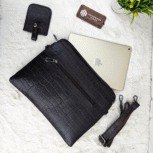Handmade leather tablet sleeve in brown with strap