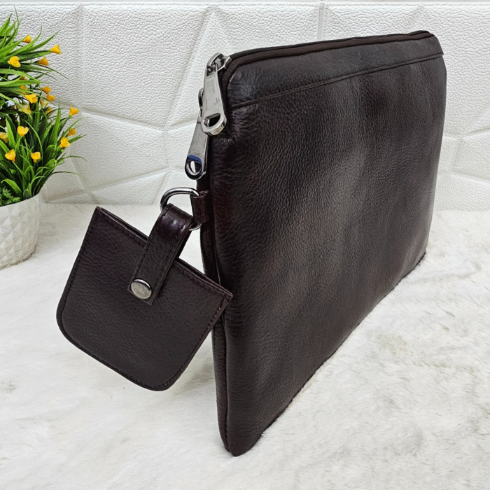 Handmade leather tablet sleeve in brown with strap