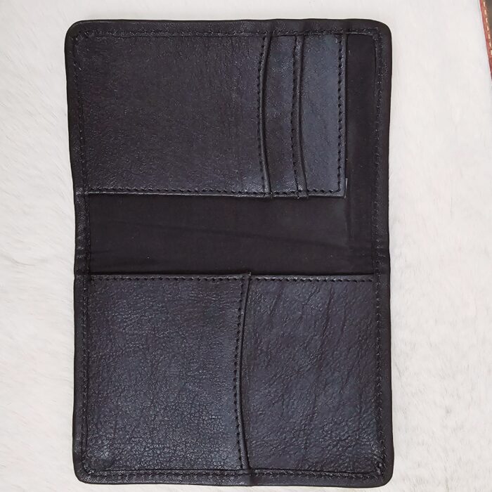 Hair-on-hide leather passport holder open with cards