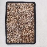 Hair-on-hide leather passport holder open with cards