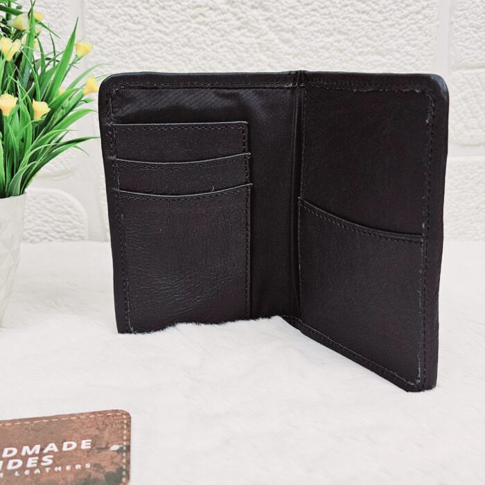 Hair-on-hide leather passport holder open with cards