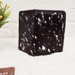 Hair-on-hide leather passport holder open with cards