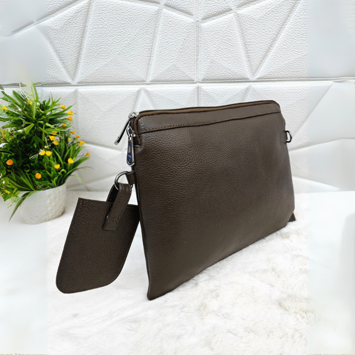Handmade leather tablet sleeve in brown with strap