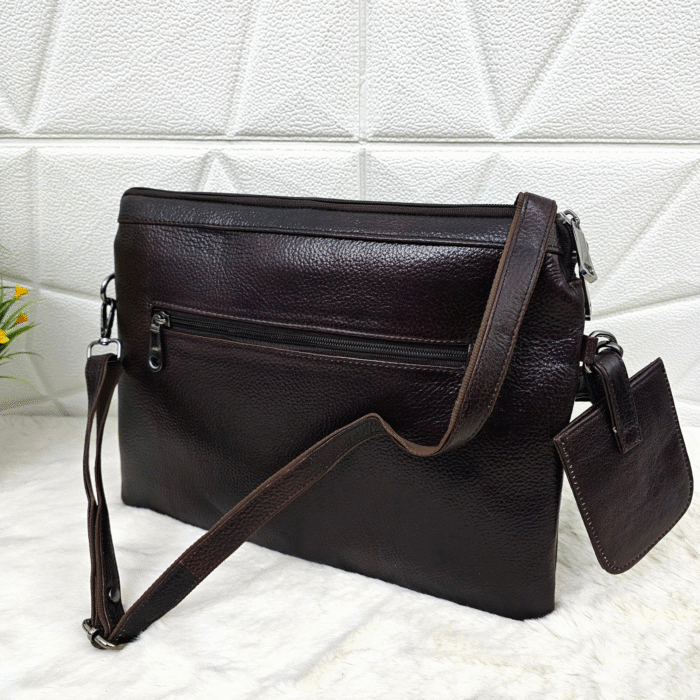 Handmade leather tablet sleeve in brown with strap