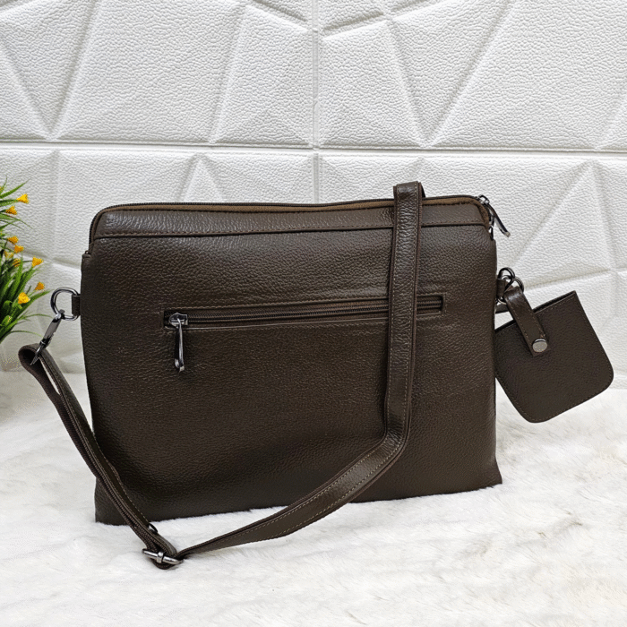 Handmade leather tablet sleeve in brown with strap