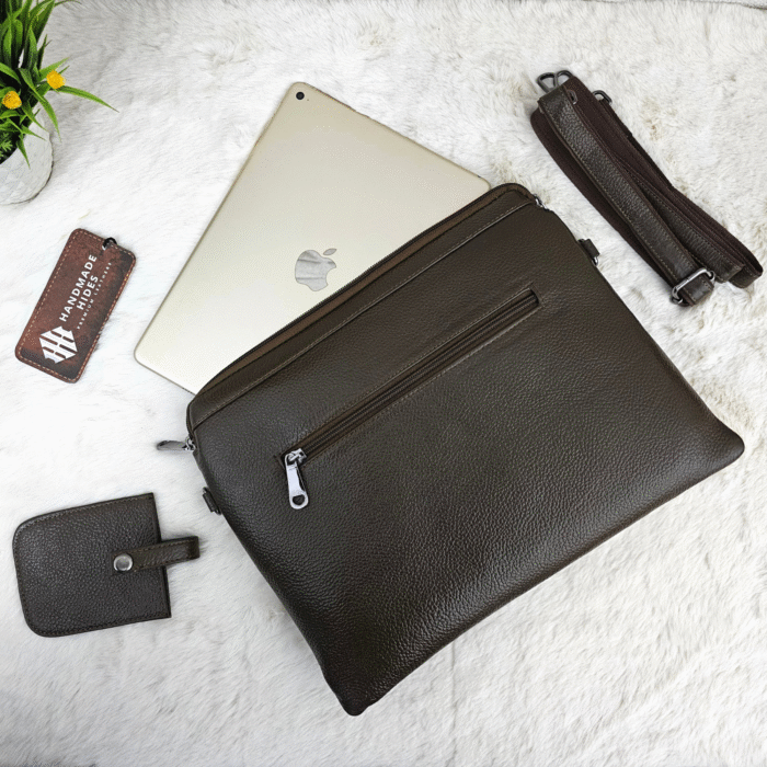Handmade leather tablet sleeve in brown with strap