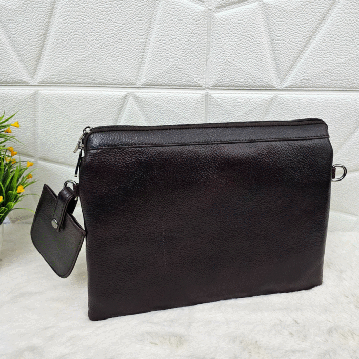 Handmade leather tablet sleeve in brown with strap