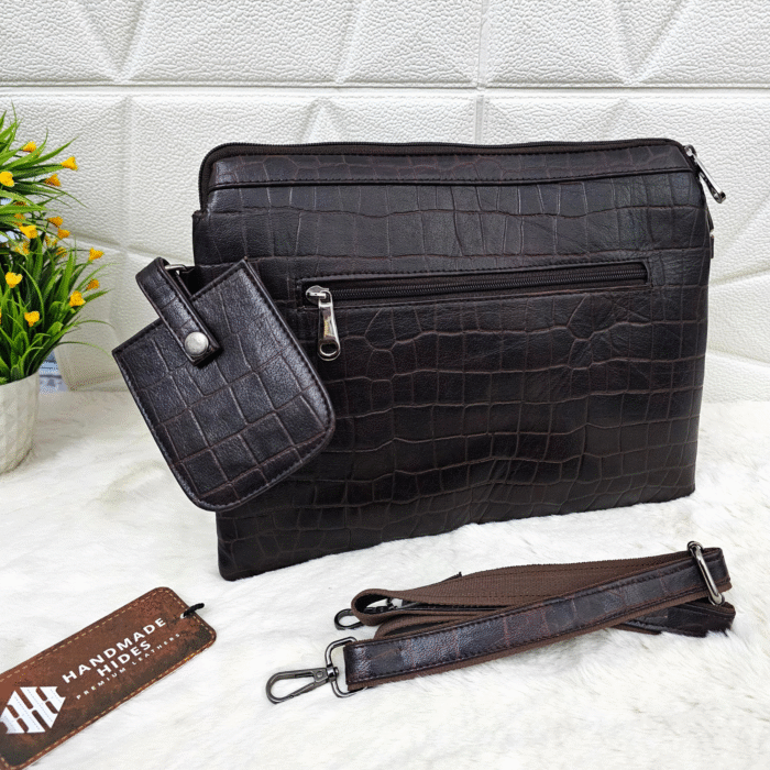 Handmade leather tablet sleeve in brown with strap